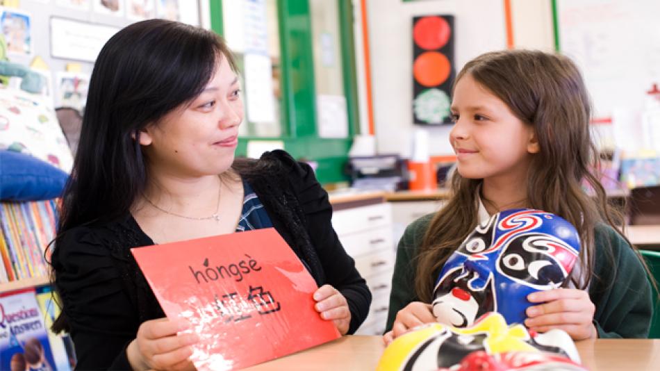 Language assistant teaching girl in the UK.
