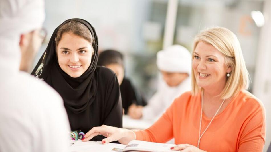 Teacher with two students