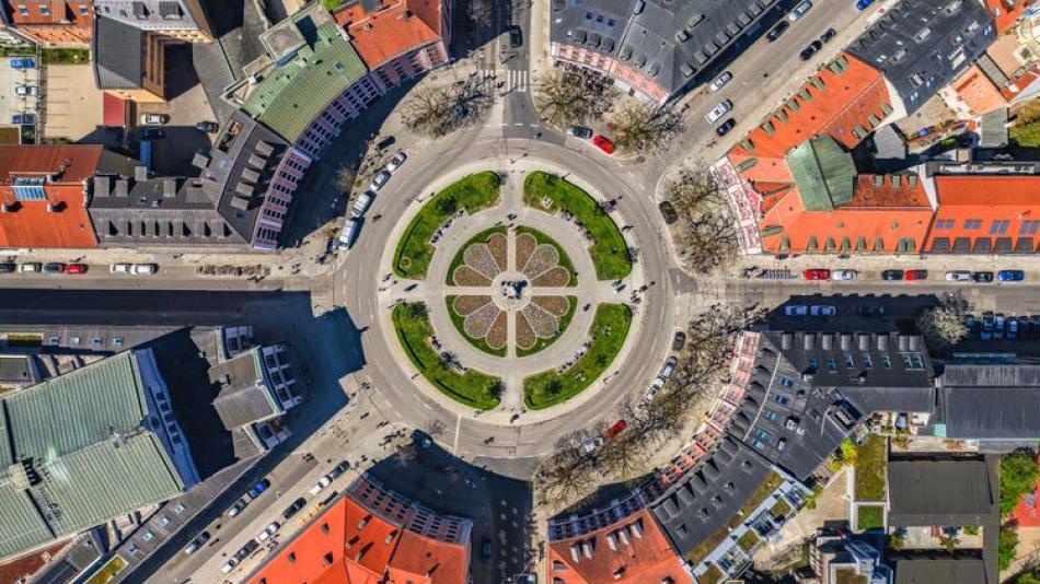 Top view of a city with roads intersecting in the centre